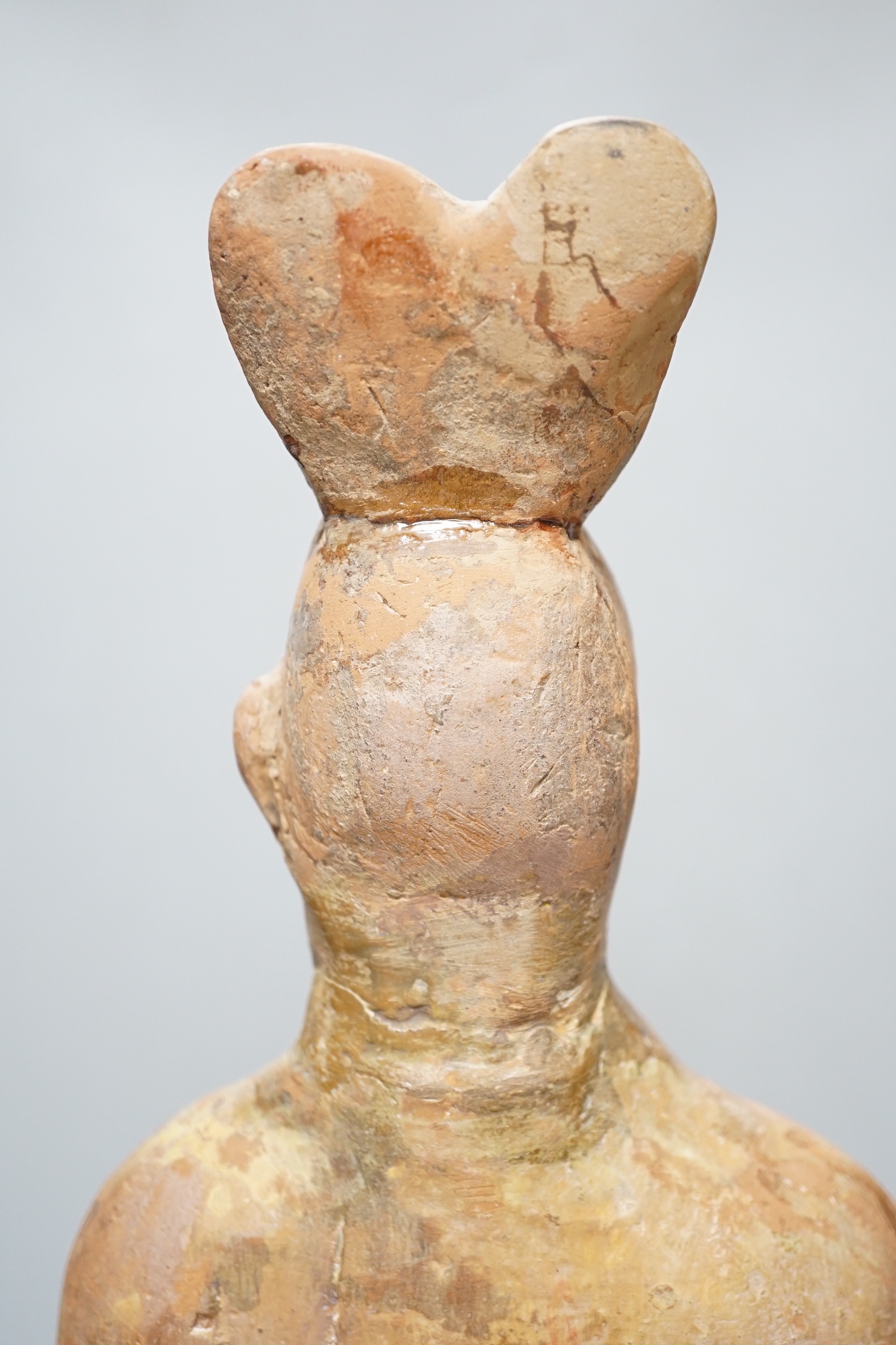 A large Chinese terracotta figure, Tang style, 55cm